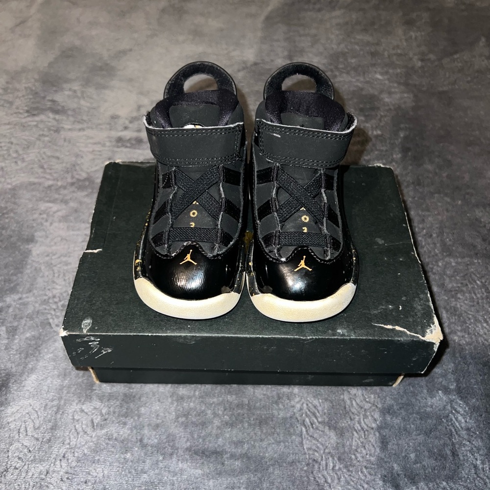 Air Jordan Six Rings Kids Sneakers with Gold Accents